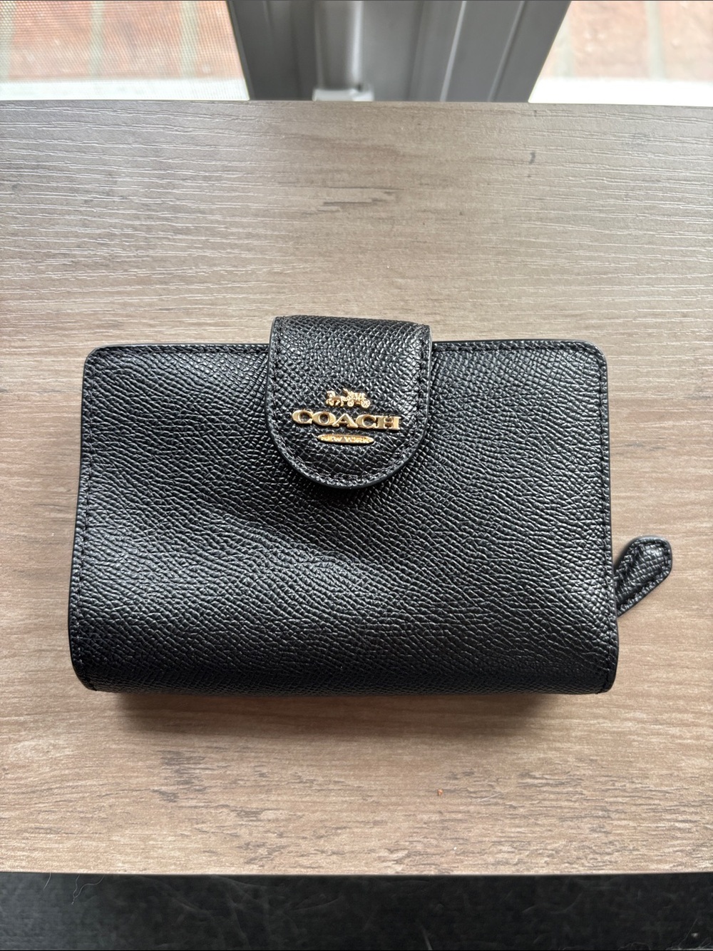 Coach Black Pebbled Snap Wallet with Gold Logo